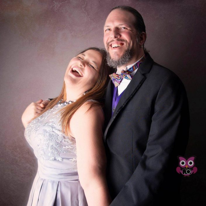 Happy Couple poses in Studio - Laughing