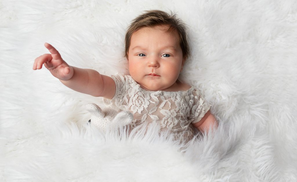 newborn Baby Girl with bunny prop