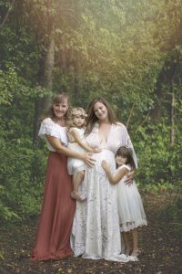 Beautiful family poses for photos in the fall for a Maternity session in Cambridge Ontario